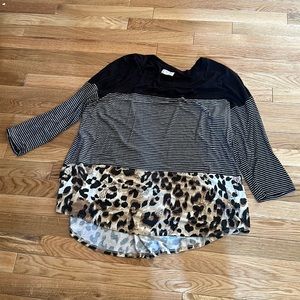 Maurice’s plus size 1 block tunic top. Traditional size would be an XXL.